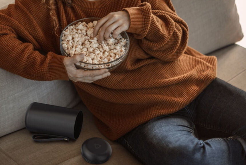 Eating popcorns while watching a movie with Vive Flow